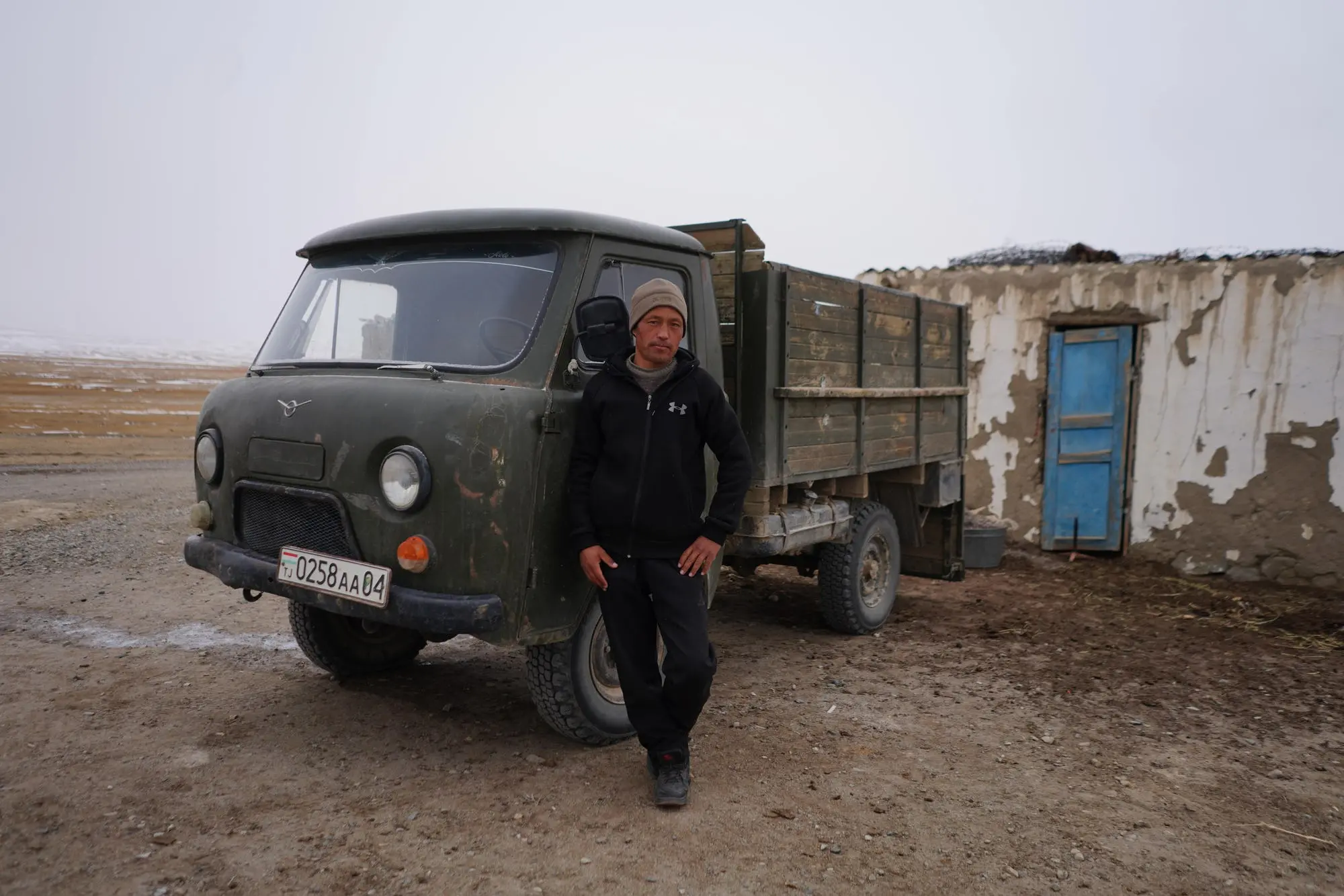 Man leans against a truck