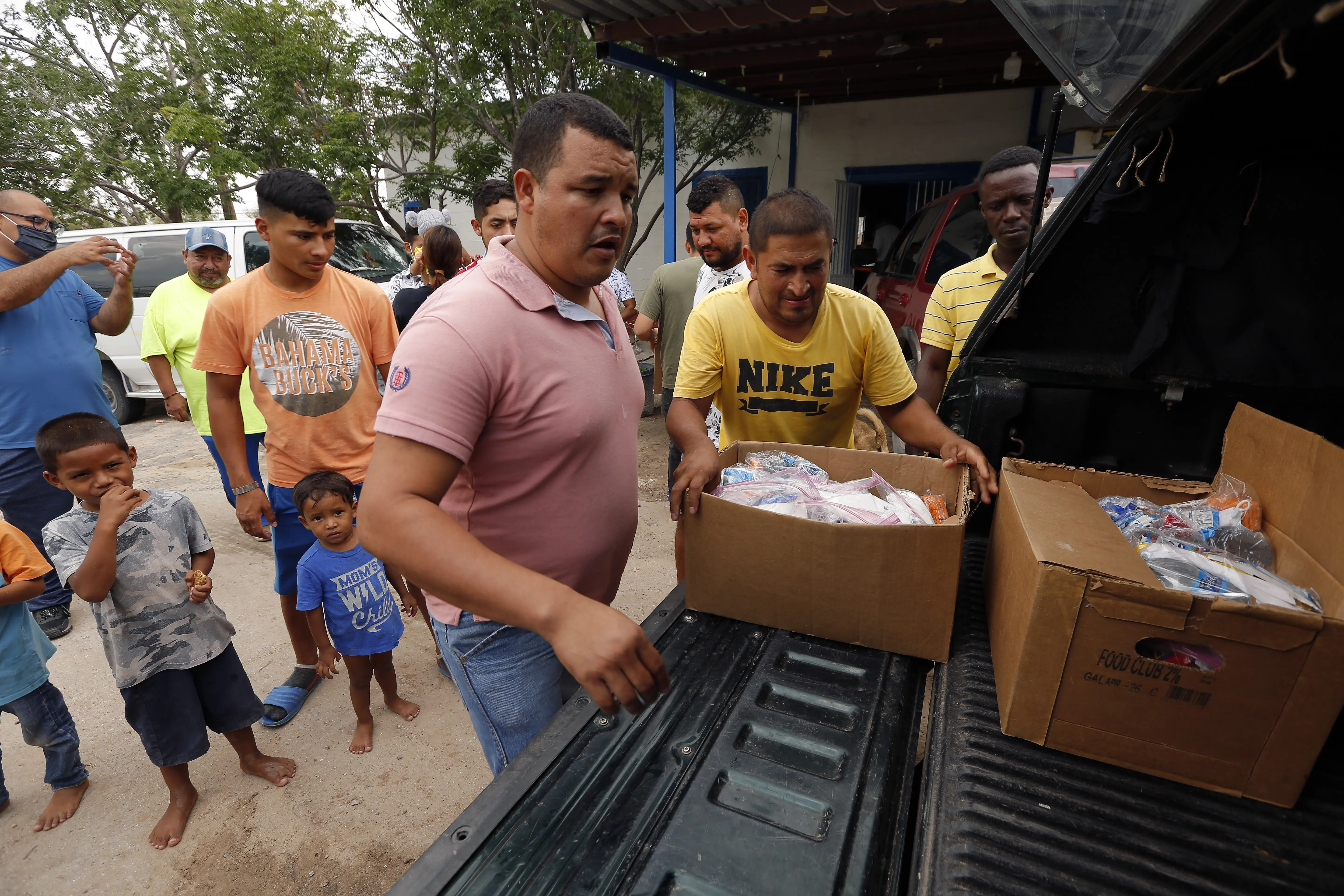 residents unload donations from truck