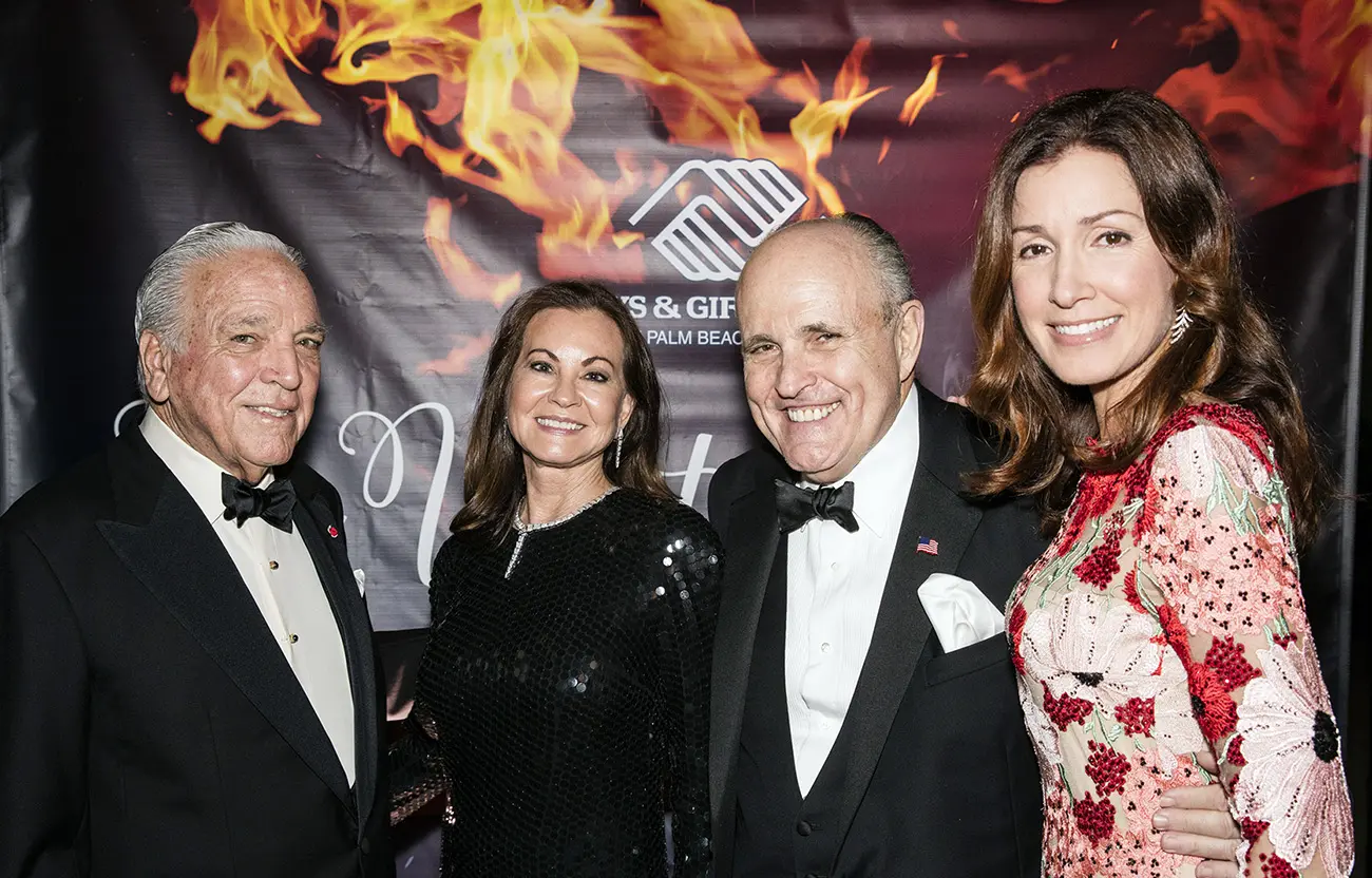 A Fanjul family member and Rudy Giuliani at a charity event