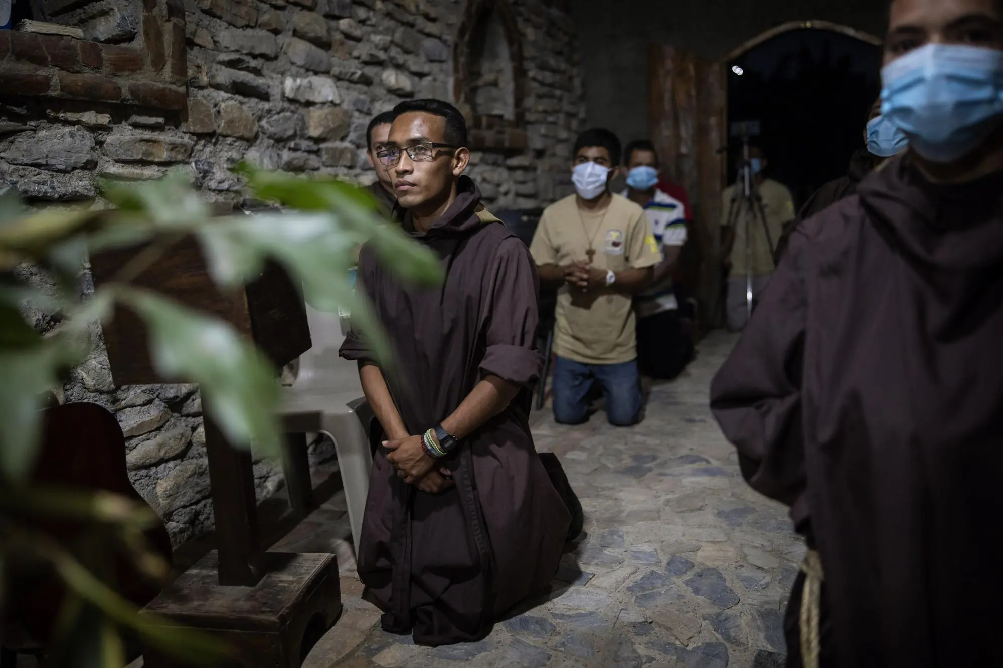 Seminaries pray during a mass 