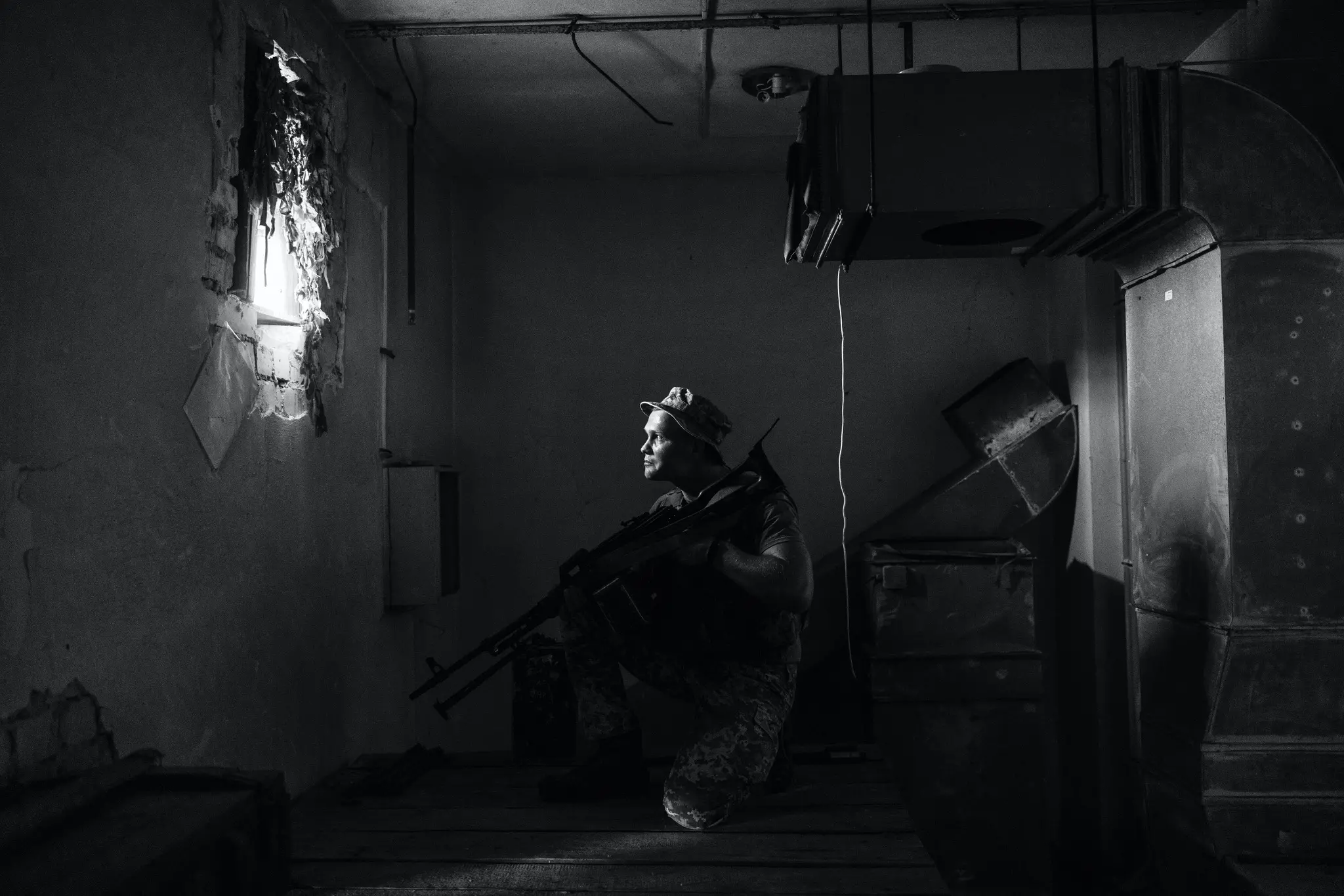 A man holds a gun