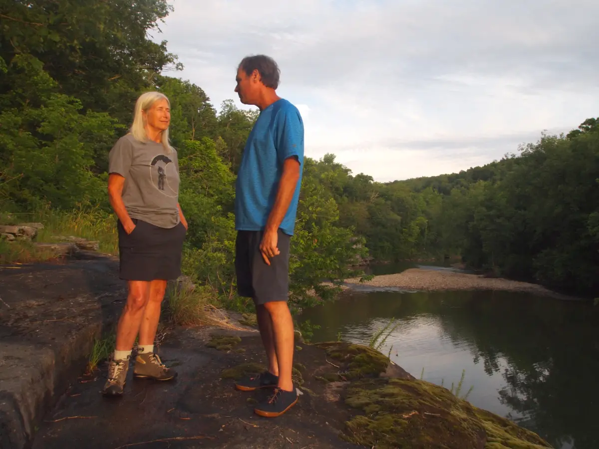 husband and wife overlook the Little Buffalo tributary