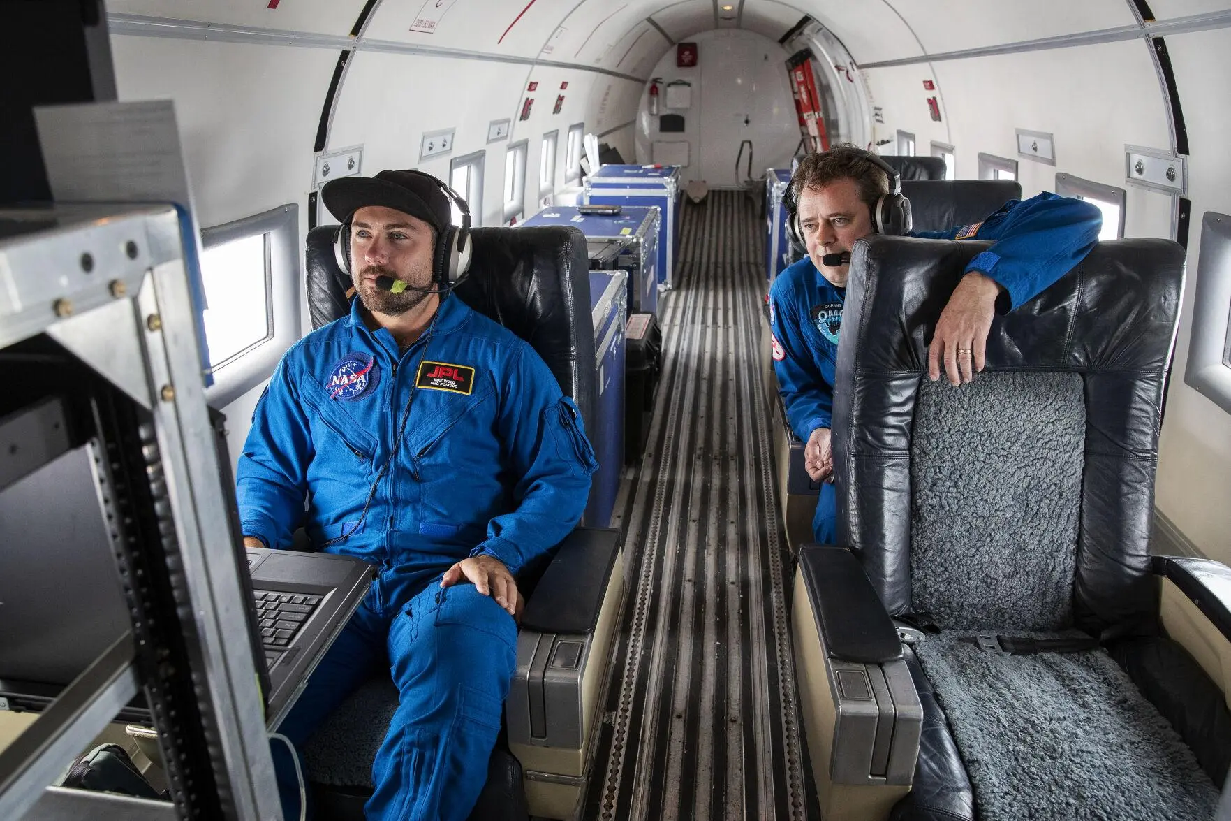 Nasa scientists study data in a lab