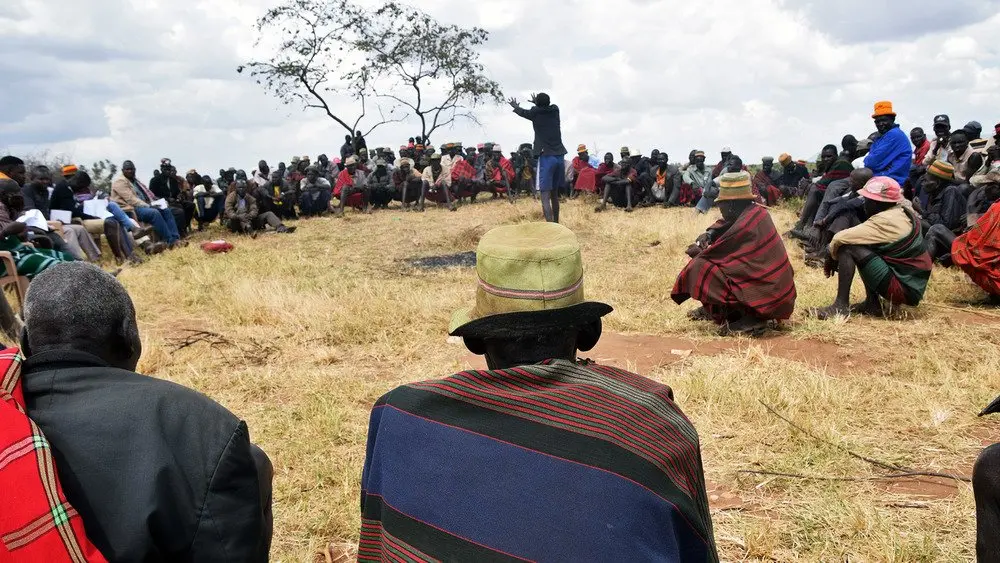 Community meeting after a cattle raid