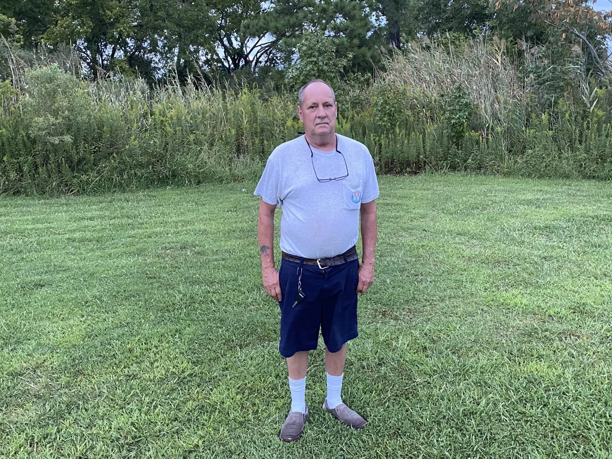 Mark Chorik stands in his backyard in Poquoson