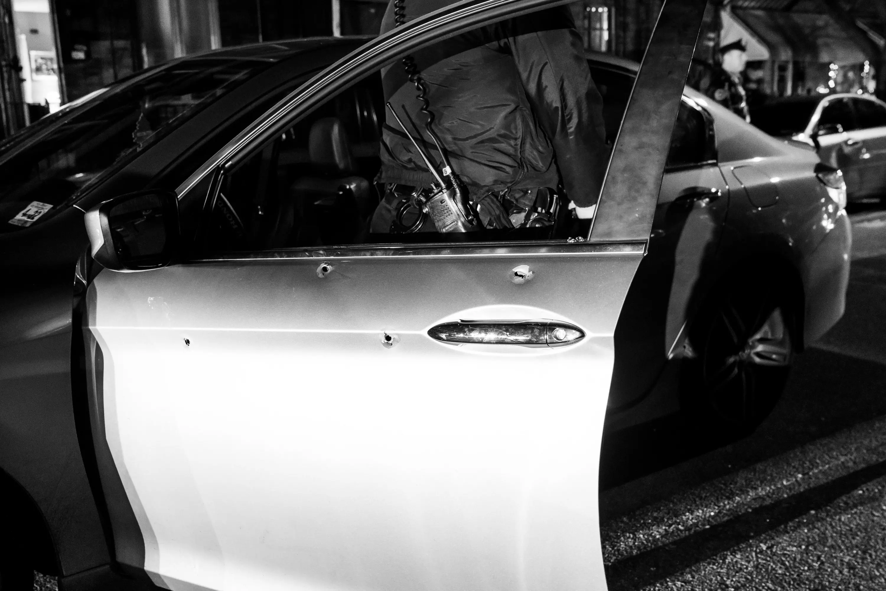 bullet holes in a car in Kensington