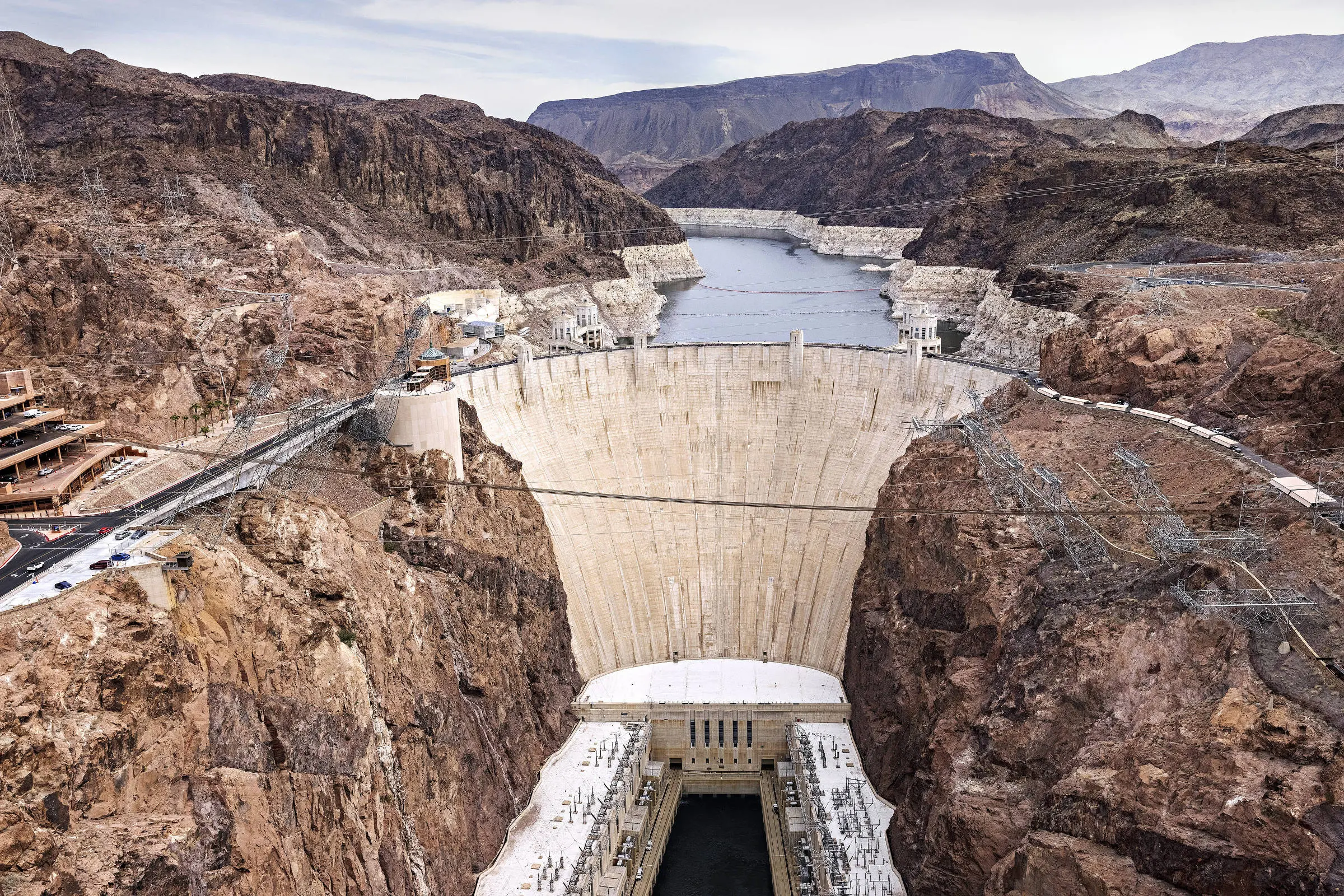 Cars drive along hoover dam