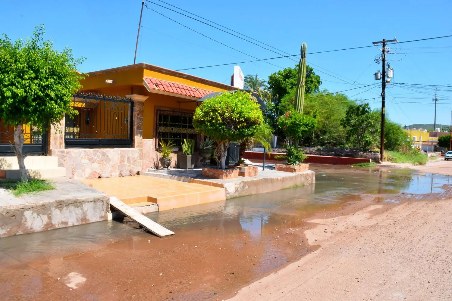 A small ramp to get into a salon to avoid sewage water