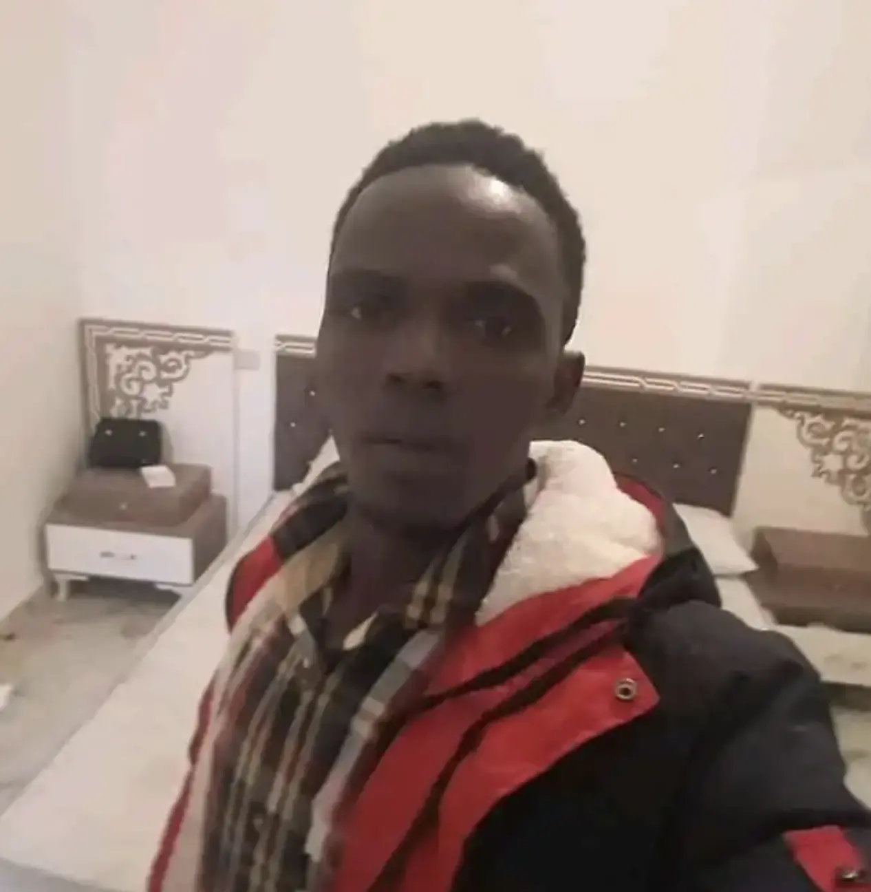 Selfie of man in a coat