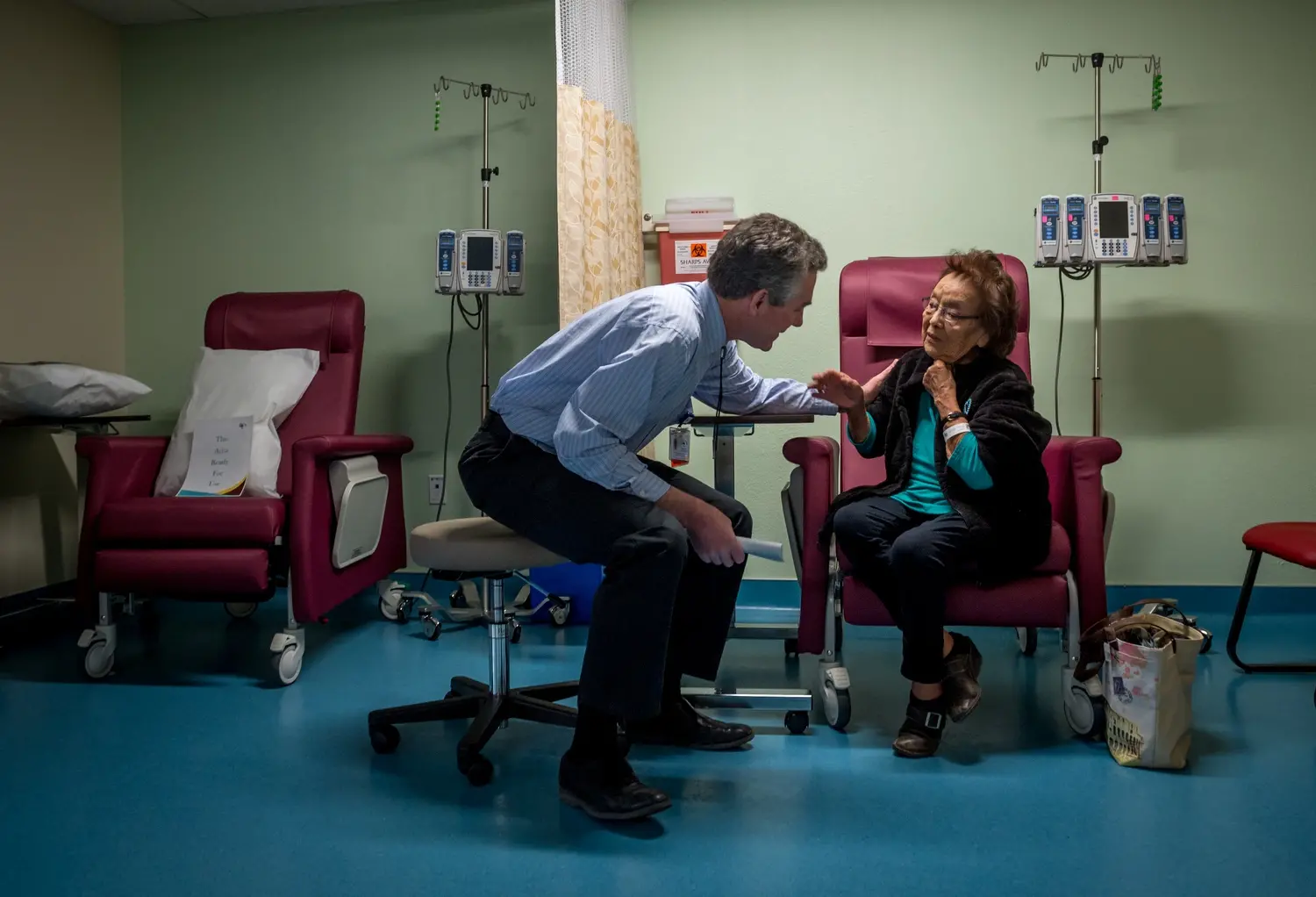 Dr. Frank Dalichow talks to a cancer patient. Image by Mary F. Calvert. United States, 2020.