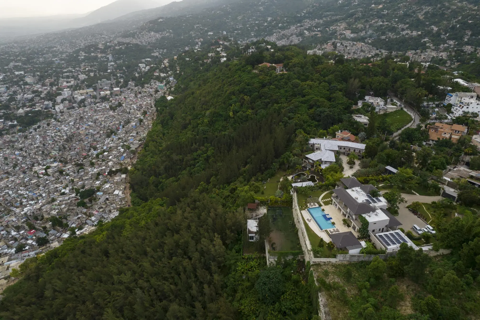 Overhead view of the rich and poor neighborhoods separated 