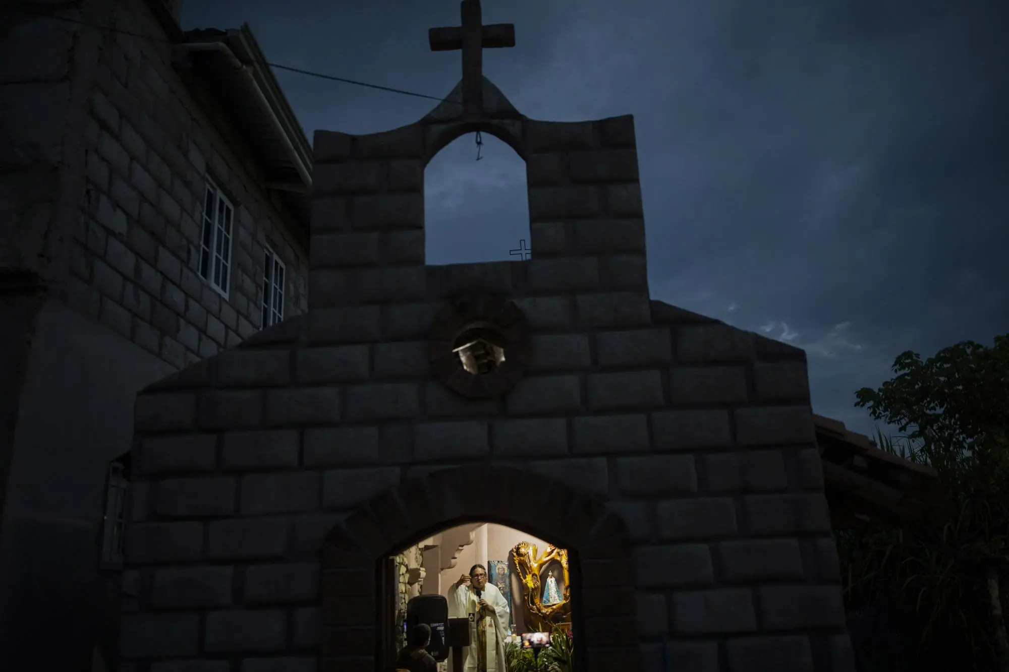 Priest leads a mass broadcast via Facebook