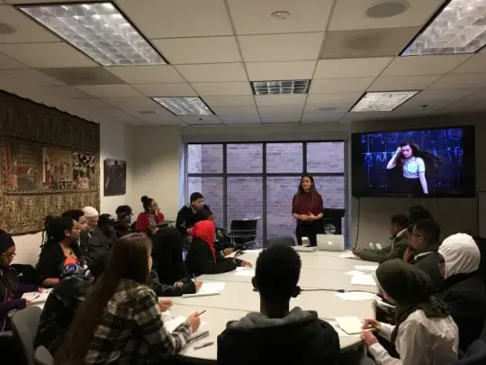 Photojournalist Natalie Keyssar presents photography from her reporting on activism by youth in Venezuela to students from Culture at Home, a support group for homeschooled students in DC, Maryland and Virginia. After Keyssar's presentation, students wrote opinion pieces inspired by the reporting using the instructions below from their teacher Pier Penic. Image by Fareed Mostoufi. United States, 2017. Media file: screen_shot_2019-08-12_at_1.08.44_pm.png