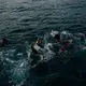 Boys swim in the water near Bir Fuqum, Yemen. Image by Alex Potter. Yemen, 2018.