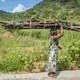 Women in Malawi spend up to 6 hours a day collecting firewood for cooking and heating. Image by Nathalie Bertrams. Malawi, 2017.