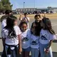 Campers pose for a photo outside the Federal Correctional Institution in Dublin, California. Image by Jaime Joyce for TIME Edge. California, 2018.