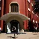 A skateboarder passes the Gran Casino, near the Monumento a la Revolución. Image by Erika Schultz. Mexico, 2019.