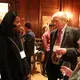 Student fellows Amanda Gordon and Monica Long speak with Pulitzer Center Senior Adviser Marvin Kalb and Mady Kalb. Image by Karena Phan. United States, 2018.