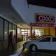 Edward Flores, 12, takes a break from hanging out in his dad's apartment before dinner by stopping by Oxxo, a local convenience store that is next to the complex, for candy with his sisters Thursday, Nov. 28, 2019. Flores and his siblings spend most of their time in the apartment during visits because of safety reasons and lack of money. Image by Amanda Cowan. Mexico, 2019.