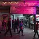 The Flores family strolls through downtown Tijuana on their way back to their car Nov. 30. Image by Amanda Cowan. Mexico, 2019.