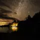 The night sky lights up over the Hanson/Kwan camp at Spencer Lake in T3 R5, in the Unorganized Territories of Maine, on Aug. 3, 2019. Image by Michael G. Seamans. United States, 2019.