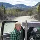 Duane Hanson hops in to his truck on Spencer Road in the Unorganized Territories in the north woods of Maine near T5 R7 on May 27, 2019. The proposed power line corridor will pass across the road at this location. Image by Michael G. Seamans. United States, 2019.