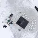 Duane Hanson hauls 16-inch square blocks of ice from his pond in T5 R7 in the Unorganized Territories on Jan. 4, 2020. The ice will be stored in an ice house with saw dust to be used to refrigerate food throughout the year. Image by Michael G. Seamans. United States, 2019.