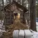 Duane Hanson cleans his ice house of old ice as he refills his stash with new blocks of ice at his homestead in T5 R7 in the Unorganized Territories on Jan. 4, 2020. Image by Michael G. Seamans. United States, 2020.