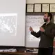 Pulitzer Center grantee Jason Motlagh describes how he reported on the collapse of the Rana Plaza textile factory in Bangladesh for journalism students at RJ Reynolds High School. Motlagh visited over 700 students in Winston-Salem, NC, in April 2017 as part of Pulitzer Center's NewsArts program. His presentation is featured as part of the film Weaving Connections. Image by Diana Greene. United States, 2017.