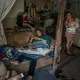 A family near Otay Canyon backs up against the border wall. Their biggest worry now is the impending plan to build a highway through the area. Their house would sit directly in its path. Image by James Whitlow Delano. Mexico, 2017.