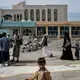 Mohammad walks through the grounds of Jumhuri Hospital, where he and his father went in search of surgical care for Mohammad's fistula. Image by Alex Potter. Yemen, 2018.