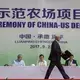 Rick Kimberley, a fifth generation family farmer from rural Maxwell, walks across the stage to speak during the groundbreaking of the China-U.S. Demonstration Farm on Saturday, Sept. 23, 2017, in Luanping County, Hebei, China. The farm in China will be modeled after Kimberley's farm in Iowa. Image by Kelsey Kremer.