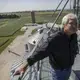 Rick Kimberley, a fifth generation family farmer of Maxwell, stands at the top of one of his grain bins on a late summer day, Tuesday, Sept. 5, 2017, in rural Polk County. Kimberley's farm is being used as a model for the China-US Demonstration Farm being built in China. Image by Kelsey Kremer.