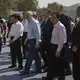 Hebei Party Secretary, Zhafo Kezhi, US Ambassador to China, Terry Branstad, Vice Minister of Agriculture‎, Qu Donyu, and farmers from Iowa, Grant and Rick Kimberley, walk together through the groundbreaking ceremony for the China-US Demonstration Farm on Saturday, Sept. 23, 2017, in Luanping County, Hebei, China. Image by Kelsey Kremer.