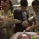 Chinese buyers take closer look at cuts of U.S. beef are set out on display at the China, U.S. beef road show on Monday, Sept. 25, 2017, at the Intercontinental Hotel in Beijing, China. The road show was meant to introduce Chinese buyers to U.S. beef after the recent opening of that market. Image by Kelsey Kremer.