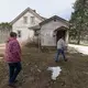 Betty Jo Johnson and Bruce Drinkman arrive to start repairing the circa-1930 house on his farm in Ridgeland. His new farm is named “Tryin' Again Dairy.” Image by Mark Hoffman. United States, 2019.