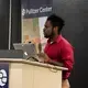 Joel Luke Van Alstine from Westchester Community College presents his reporting on adoption practices in Haiti. Image by Nora Moraga-Lewy. United States, 2019.