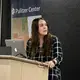 Madison Stewart from the University of Iowa College of Public Health discusses the use of pesticides in banana production in Costa Rica. Image by Nora Moraga-Lewy. United States, 2019.