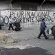 Members of FOL’s cleaning cooperative collect trash and disinfect the narrow corridors of the slum. Image by Anita Pouchard Serra. Argentina, 2020.