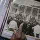 Johnson points to an old photo of a gathering after the death of Rev. Martin Luther King Jr., during an interview with The Associated Press, in Meridian, Miss. Image by Wong Maye-E / The Associated Press. United States, 2020.
