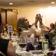 Sawsan Morrar, 2017 UC Berkeley Graduate School of Journalism fellow, photographs during the evening remarks. Image by Lorraine Ustaris. Washington, D.C., 2018.