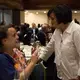 Jina Moore, East Africa Bureau Chief for The New York Times, and filmmaker Jen Marlowe converse during a break between dinner speakers. Image by Lorraine Ustaris. Washington, D.C., 2018.