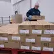 Kathy Griffey, top, and Kristin Geary, bottom right, work on an assembly line packaging Balanced Breaks snacks at Sargento Foods Inc. The company employs about 2,300 people in Wisconsin. Image Courtesy of Mark Hoffman. United States, 2019.