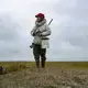 Vebjørn Aishana Reitan, polar bear guide and certified U.S. Coast Guard captain, on the coastal plain. Image by Nick Mott. United States, 2019.