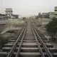 Wall Across Trestle Bridge, Orange Town Station, Karachi, Pakistan. Image from KCR, by Ivan Sigal. Pakistan, 2014-2017.
