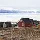 Many of the town’s inhabitants live in permafrost areas, and their homes were built on frozen ground. But as the permafrost has thawed, the ground has become less capable of supporting their homes, which can become dangerous to inhabit. Greenland, 2019. Image by Anna Filipova. 