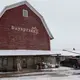 The lower level of this dairy barn where cow stalls used to be is now used for wine tastings and a store at Munson Bridge Winery. Image by Mark Hoffman. United States, 2019.