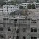 The Haitian government recommends that builders follow earthquake-resistant standards. But because Parliament has not voted on a national building code, there is no way to enforce it in construction, like at this apartment building going up in Port-au-Prince. Image by Jose A. Iglesias. Haiti, 2019.