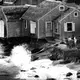 Erosion threatened a house on Andrew Harding Road in Chatham during a storm at high tide on Jan. 20, 1988. Image by Barry Chin. United States, 1988.