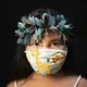Iasmin, 8, of the Sateré Mawé indigenous ethnic group, poses for a portrait wearing the traditional dress of her tribe and a face mask amid the spread of the new coronavirus in Manaus, Brazil, Wednesday, May 27, 2020. Image by Felipe Dana / AP Photo. Brazil, 2020.